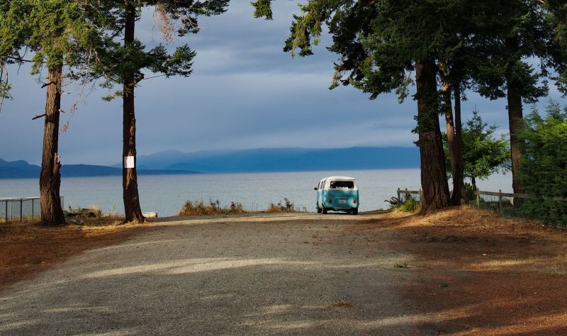 a VW bus at the end of a road symbolizing digital marketing success